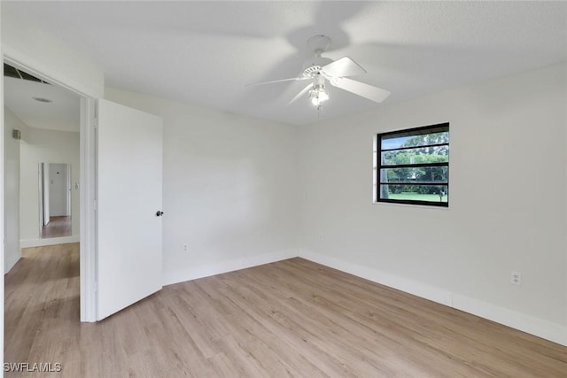4925 Molokai Dr Unit 16, Naples, FL 34112 - spare room with light wood finished floors and a ceiling fan