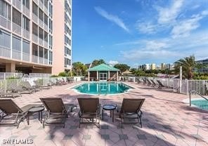 170 Lenell Rd Unit 202, Fort Myers Beach, FL 33931 - community pool featuring a patio area