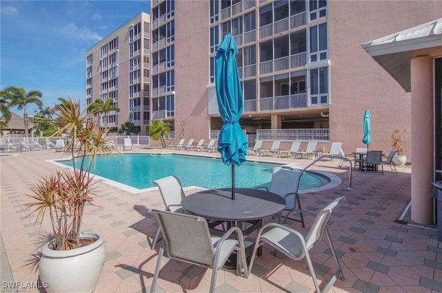 170 Lenell Rd Unit 202, Fort Myers Beach, FL 33931 - community pool featuring a patio