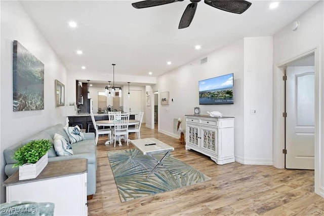 170 Lenell Rd Unit 202, Fort Myers Beach, FL 33931 - living area with a ceiling fan, recessed lighting, and light wood-type flooring