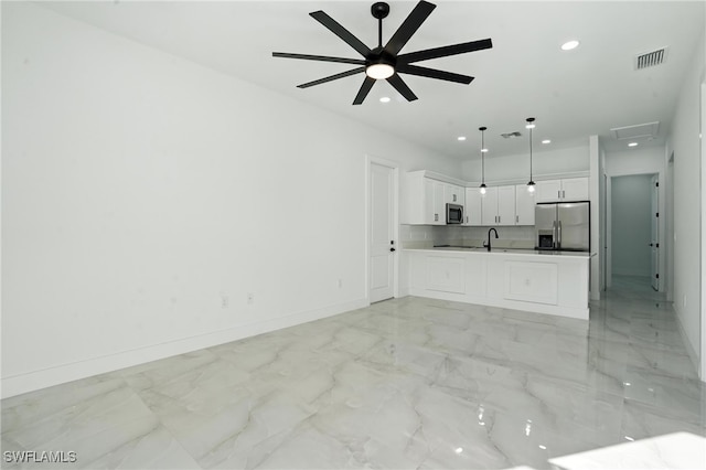 4881/4883 Leonard Blvd S, Lehigh Acres, FL 33973 - unfurnished living room featuring a ceiling fan, recessed lighting, and light marble finish flooring