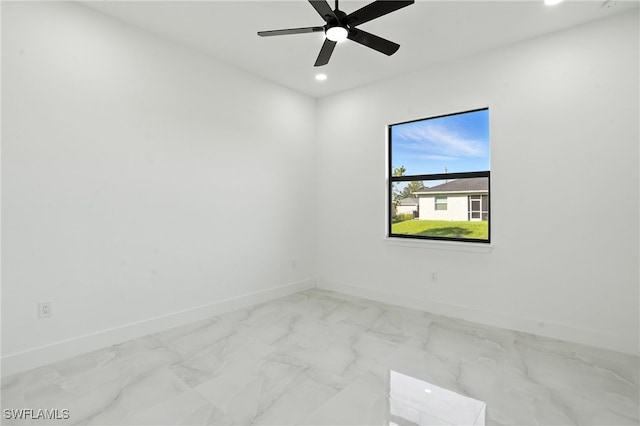 4881/4883 Leonard Blvd S, Lehigh Acres, FL 33973 - empty room featuring recessed lighting, a ceiling fan, and marble finish flooring