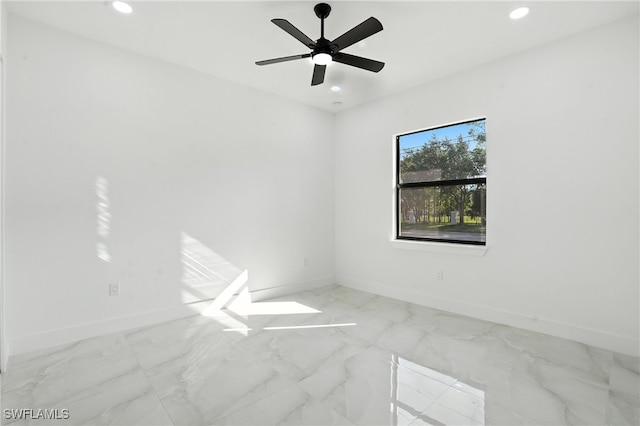 4881/4883 Leonard Blvd S, Lehigh Acres, FL 33973 - unfurnished room with recessed lighting and marble finish flooring