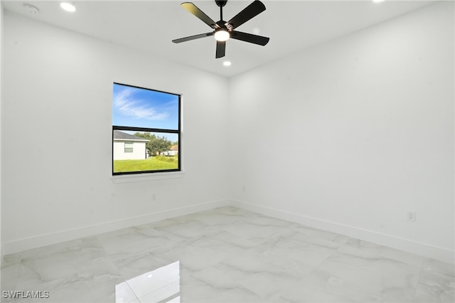 4881/4883 Leonard Blvd S, Lehigh Acres, FL 33973 - empty room with a smoke detector, recessed lighting, light marble finish flooring, and a ceiling fan