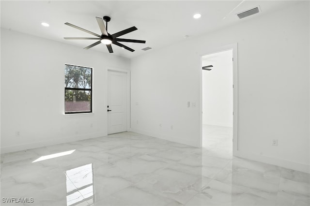 4881/4883 Leonard Blvd S, Lehigh Acres, FL 33973 - empty room with light marble finish floors, recessed lighting, and ceiling fan
