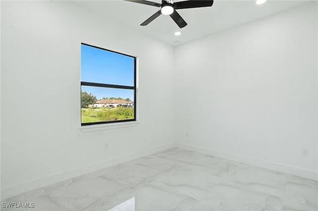 4881/4883 Leonard Blvd S, Lehigh Acres, FL 33973 - unfurnished room featuring recessed lighting, light marble finish flooring, and a ceiling fan