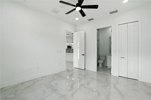 4881/4883 Leonard Blvd S, Lehigh Acres, FL 33973 - unfurnished bedroom with recessed lighting, light marble finish flooring, ensuite bath, and ceiling fan