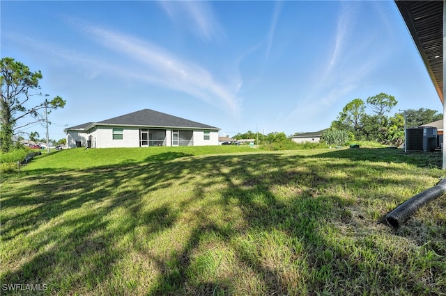 4881/4883 Leonard Blvd S, Lehigh Acres, FL 33973 - view of grassy yard