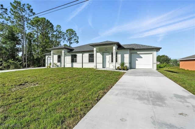 4881/4883 Leonard Blvd S, Lehigh Acres, FL 33973 - prairie-style home with a garage, driveway, a front lawn, and stucco siding