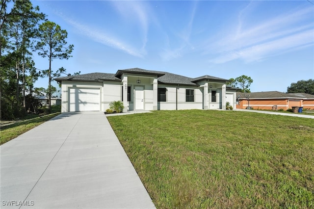 4881/4883 Leonard Blvd S, Lehigh Acres, FL 33973 - prairie-style home featuring a garage, a front yard, concrete driveway, stucco siding, and roof with shingles