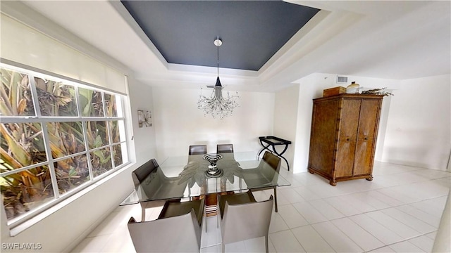 2115 Arielle Dr Unit 2602, Naples, FL 34109 - dining area with a chandelier, a tray ceiling, and tile patterned flooring