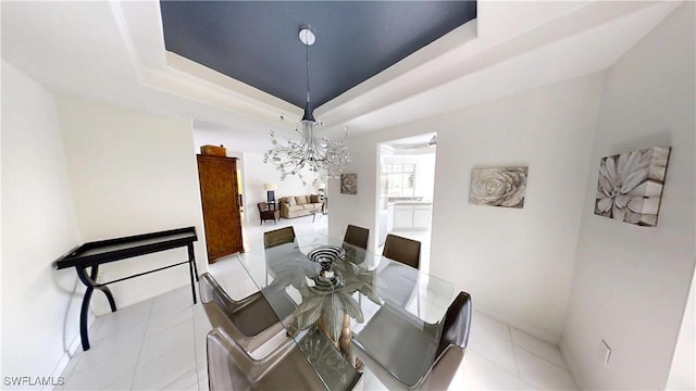 2115 Arielle Dr Unit 2602, Naples, FL 34109 - dining space featuring a chandelier, a raised ceiling, and light tile patterned flooring