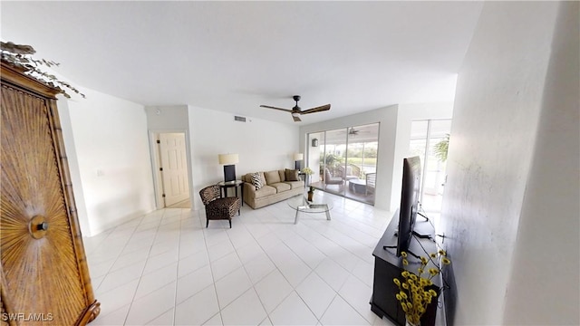2115 Arielle Dr Unit 2602, Naples, FL 34109 - living area with a ceiling fan and light tile patterned floors