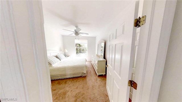 2115 Arielle Dr Unit 2602, Naples, FL 34109 - bedroom featuring light colored carpet and a ceiling fan