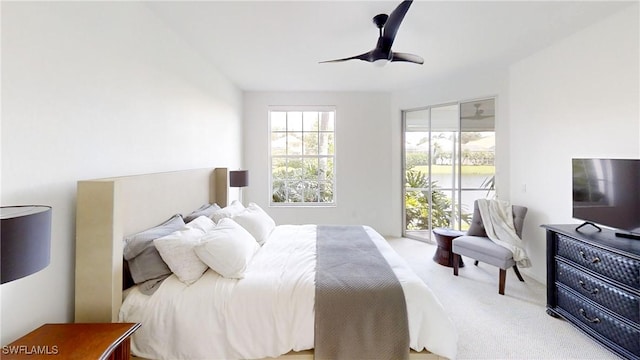 2115 Arielle Dr Unit 2602, Naples, FL 34109 - bedroom with access to outside, carpet flooring, and a ceiling fan