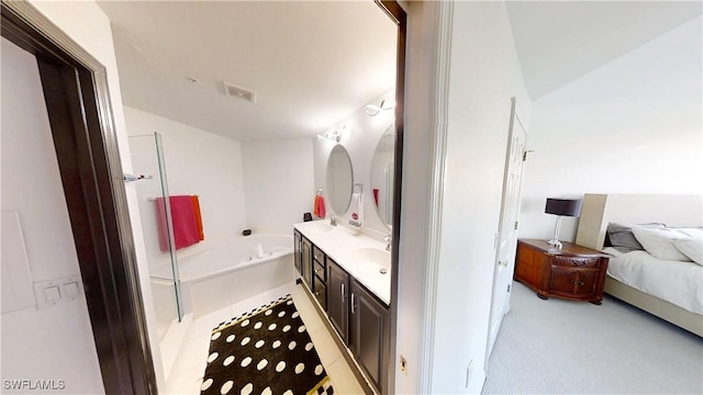 2115 Arielle Dr Unit 2602, Naples, FL 34109 - full bathroom featuring a bath, double vanity, and connected bathroom