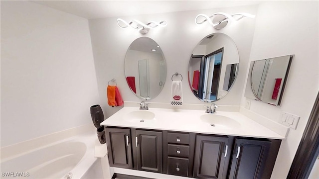 2115 Arielle Dr Unit 2602, Naples, FL 34109 - full bath with double vanity and a garden tub