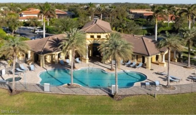 23056 Sanabria Loop, Bonita Springs, FL 34135 - community pool featuring a patio