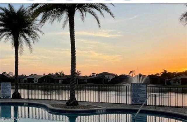 23056 Sanabria Loop, Bonita Springs, FL 34135 - community pool featuring a residential view and a water view