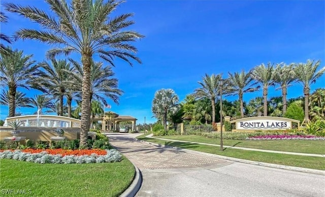 23056 Sanabria Loop, Bonita Springs, FL 34135 - community / neighborhood sign featuring a yard