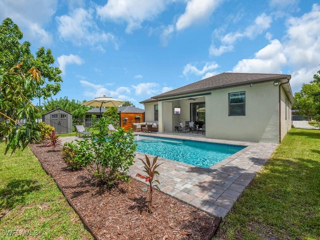 446 SW 19th Ter, Cape Coral, FL 33991 - view of swimming pool with a shed, a patio, a ceiling fan, and outdoor dining area