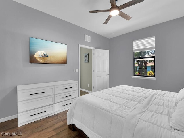 446 SW 19th Ter, Cape Coral, FL 33991 - bedroom with dark wood-type flooring and ceiling fan