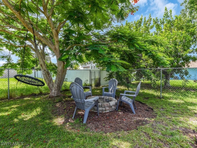 446 SW 19th Ter, Cape Coral, FL 33991 - view of yard featuring an outdoor fire pit