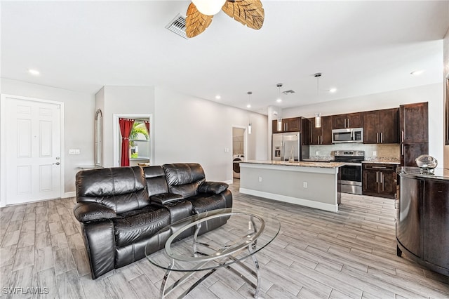 2909 NW 24th Ave, Cape Coral, FL 33993 - living room featuring light wood-style floors, recessed lighting, and a ceiling fan