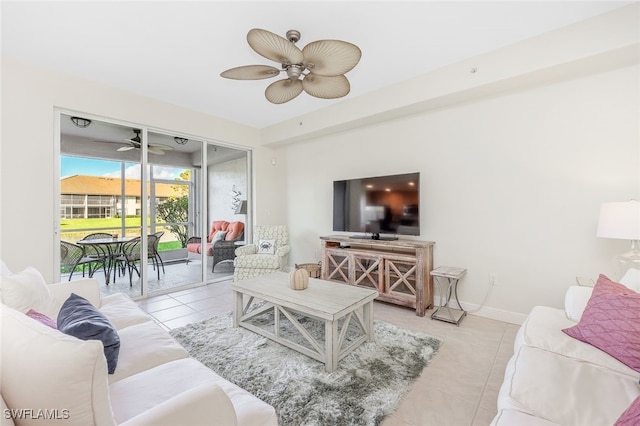 1128 Manor Lake Dr Unit G103, Naples, FL 34110 - living room featuring tile patterned flooring and ceiling fan