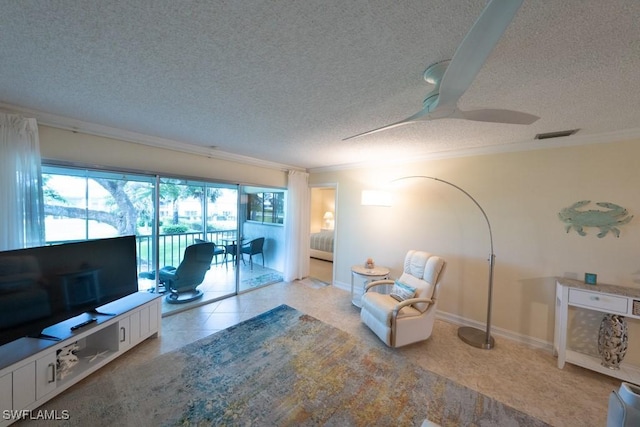 325 Charlemagne Blvd Unit C204, Naples, FL 34112 - living room with crown molding, a textured ceiling, a ceiling fan, and light tile patterned floors