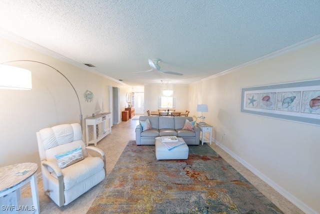325 Charlemagne Blvd Unit C204, Naples, FL 34112 - living room with a textured ceiling, ceiling fan, and ornamental molding