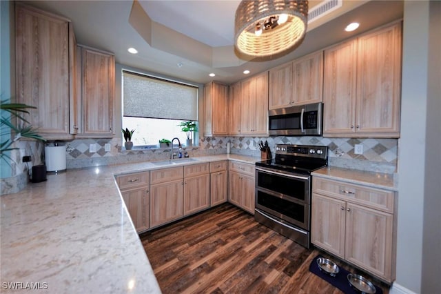 4182 Bay Beach Ln Unit 746, Fort Myers Beach, FL 33931 - kitchen featuring stainless steel appliances, light brown cabinets, tasteful backsplash, and recessed lighting