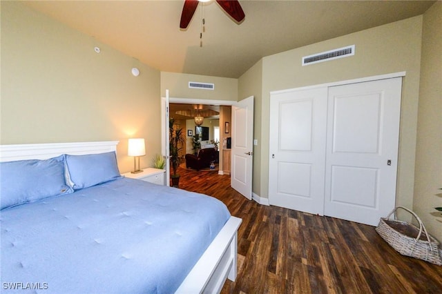 4182 Bay Beach Ln Unit 746, Fort Myers Beach, FL 33931 - bedroom featuring dark wood-type flooring, a closet, and a ceiling fan