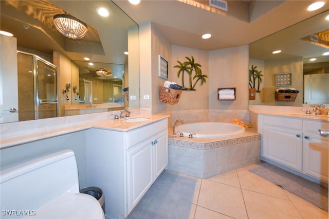 4182 Bay Beach Ln Unit 746, Fort Myers Beach, FL 33931 - full bathroom with tile patterned flooring, a stall shower, two vanities, a bath, and recessed lighting