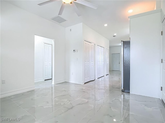 3705 8th St SW, Lehigh Acres, FL 33976 - unfurnished room with a ceiling fan, light marble finish floors, and recessed lighting