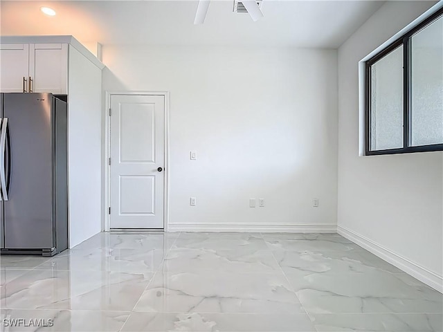 3705 8th St SW, Lehigh Acres, FL 33976 - empty room featuring light marble finish floors, recessed lighting, and ceiling fan