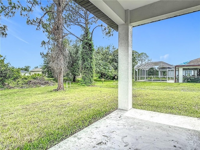 3705 8th St SW, Lehigh Acres, FL 33976 - view of grassy yard featuring a patio area