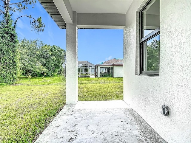 3705 8th St SW, Lehigh Acres, FL 33976 - view of green lawn featuring a patio area