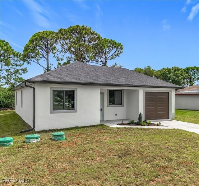 3705 8th St SW, Lehigh Acres, FL 33976 - ranch-style house with an attached garage, stucco siding, and a front yard