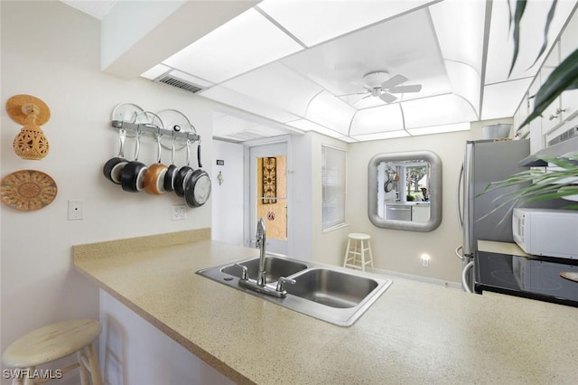 1086 Forest Lakes Dr Unit 9106, Naples, FL 34105 - kitchen featuring white microwave and a ceiling fan