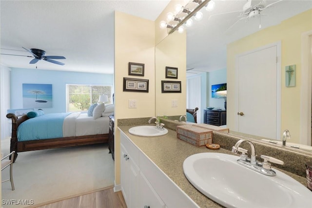1086 Forest Lakes Dr Unit 9106, Naples, FL 34105 - full bathroom with ensuite bathroom, ceiling fan, double vanity, and wood finished floors