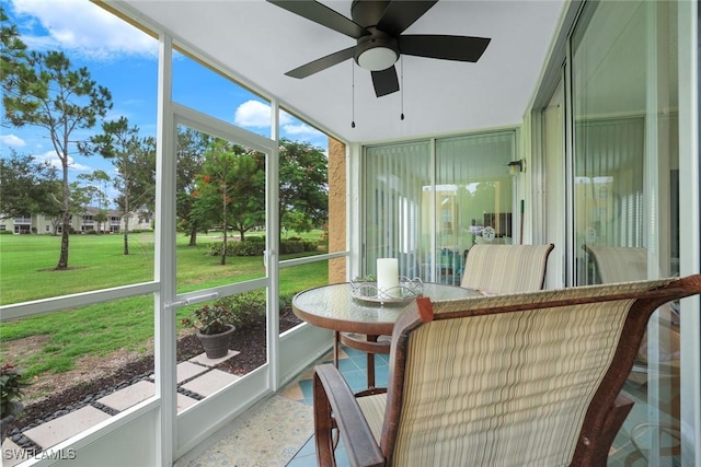 1086 Forest Lakes Dr Unit 9106, Naples, FL 34105 - sunroom / solarium with ceiling fan and healthy amount of natural light