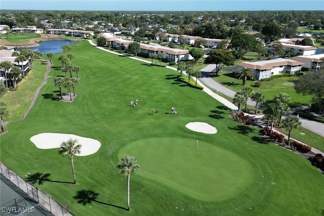 34 Glades Blvd Unit 1461, Naples, FL 34112 - aerial perspective of suburban area with a golf course and a nearby body of water