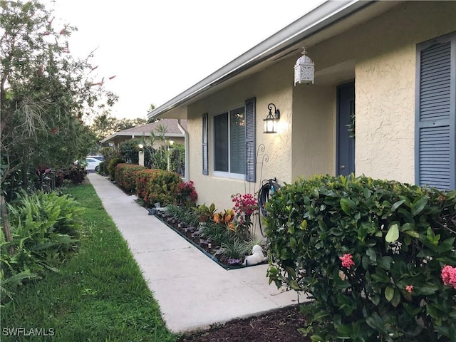 34 Glades Blvd Unit 1461, Naples, FL 34112 - entrance to property with stucco siding