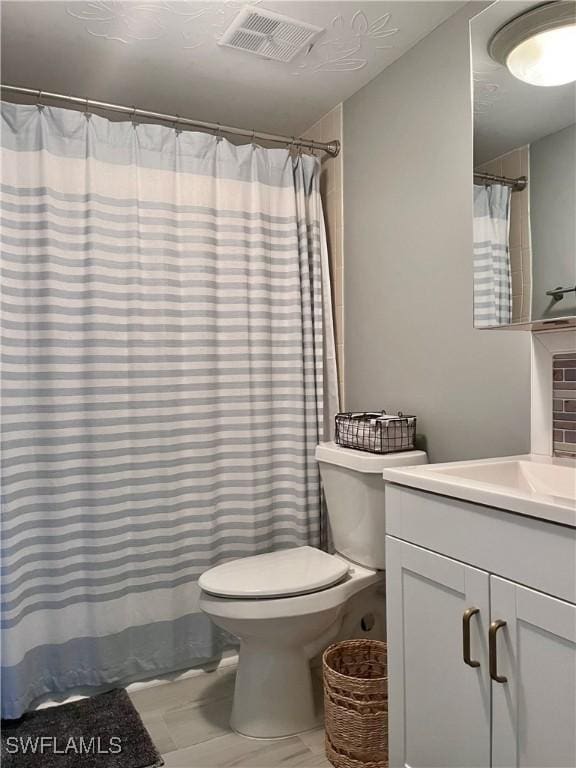 34 Glades Blvd Unit 1461, Naples, FL 34112 - bathroom with vanity and a shower with shower curtain