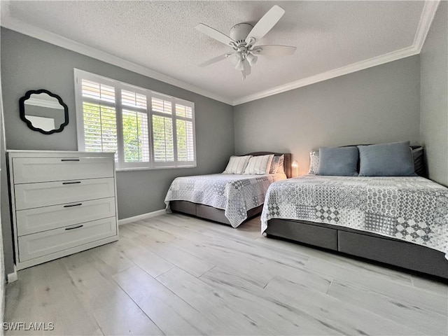 34 Glades Blvd Unit 1461, Naples, FL 34112 - bedroom with crown molding, light wood-style floors, a textured ceiling, and a ceiling fan