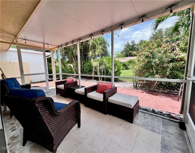 34 Glades Blvd Unit 1461, Naples, FL 34112 - sunroom featuring outdoor lounge area