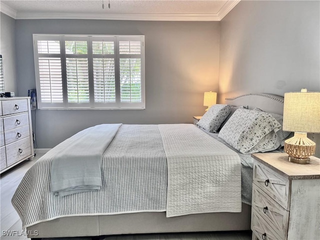 34 Glades Blvd Unit 1461, Naples, FL 34112 - bedroom featuring crown molding, multiple windows, and wood finished floors