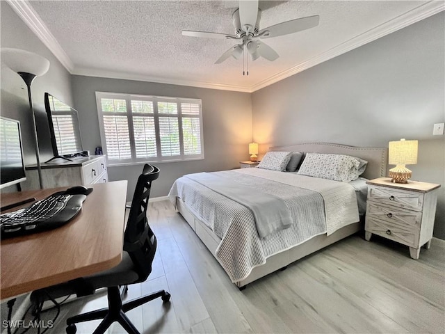 34 Glades Blvd Unit 1461, Naples, FL 34112 - bedroom featuring light wood finished floors, ornamental molding, a textured ceiling, and a ceiling fan