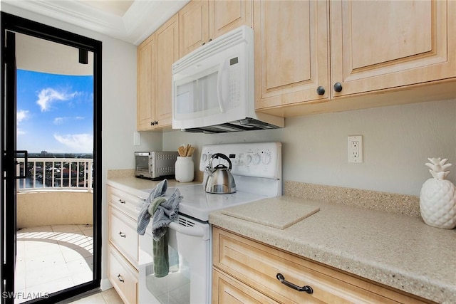 440 Seaview Ct Unit 1106, Marco Island, FL 34145 - kitchen with white appliances, light brown cabinetry, and light tile patterned floors